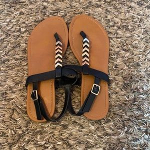 Black and gold sandals